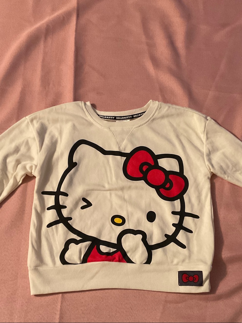 Hello Kitty Cream Crewneck Sweatshirt with Red Bow Graphic